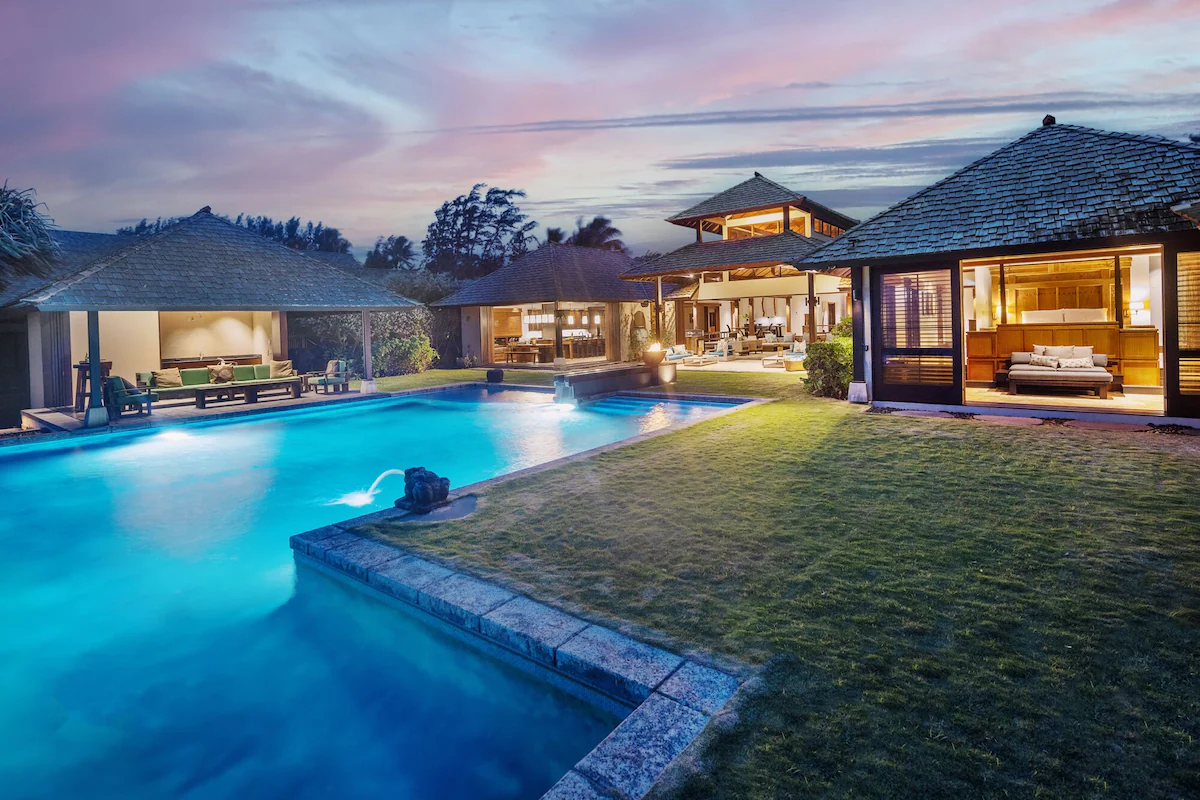 Pool and estate lit at night